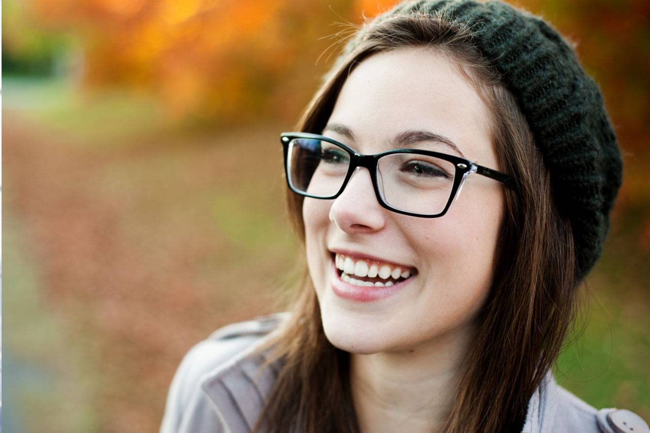 Woman wearing designer eyeglass frames